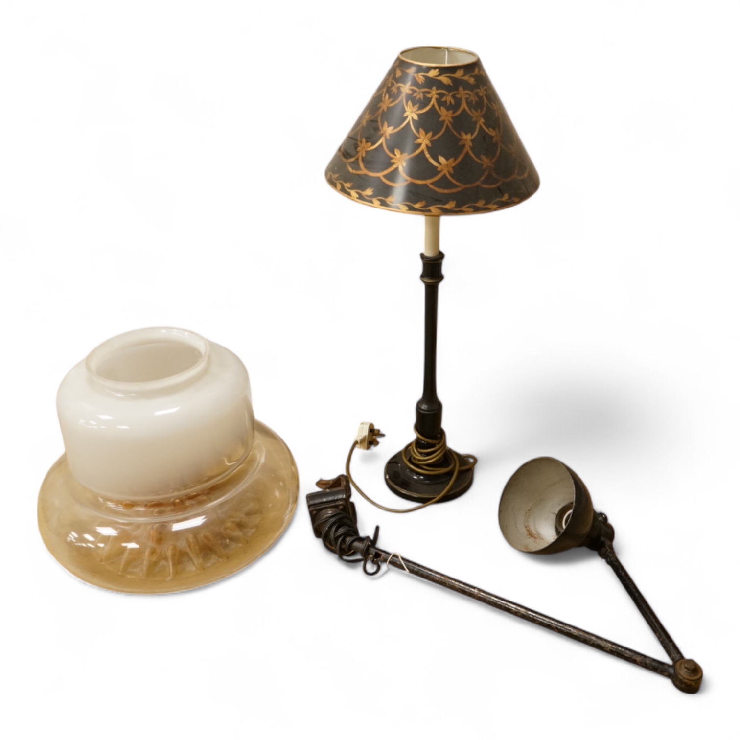 A large 1970's amber and opaque glass ceiling shade, 32cm high, Kandem model 802 adjustable lamp with clamp, 94cm high (fully extended) and a table lamp with toleware shade